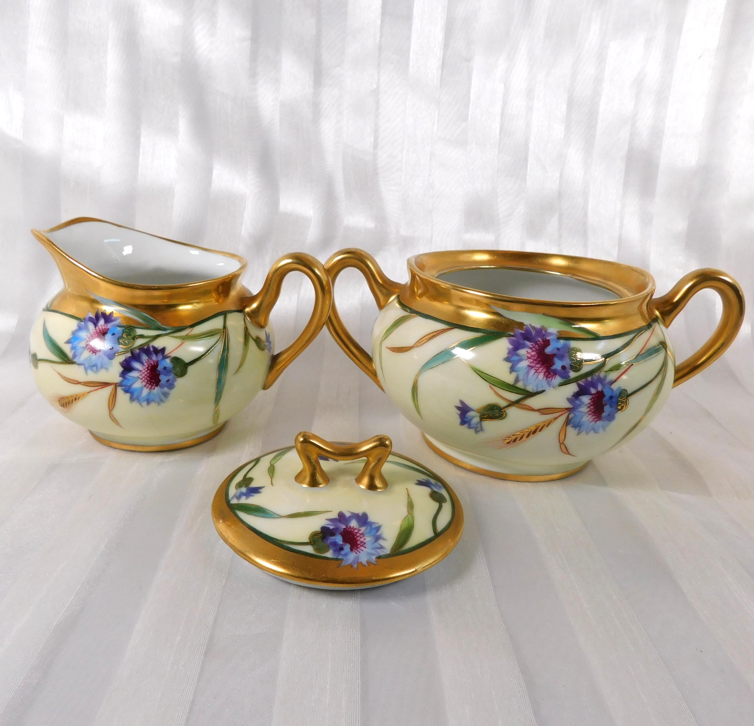 Cream and Gold Floral Sugar Bowl and Creamer Marked SW Donath # 26175